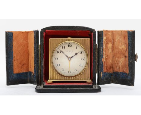 A 1920s Art Deco Zenith bedside alarm clock, having Swiss eight movement with travel case (AF) 5.5cm tall. 