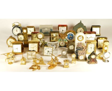 A collection of clocks, to include miniature novelty, traveling and bedside alarm clocks, having manual and quartz movements.