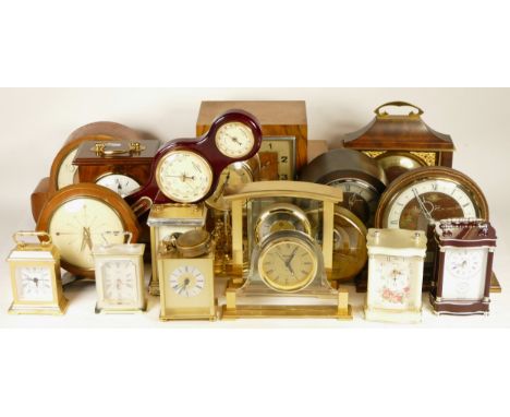A collection of mid 20th century and later mantel clocks, anniversary clocks, wall clocks, and barometers, having manual and 