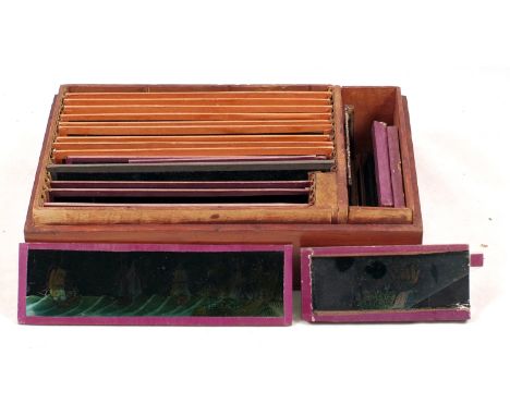 Box of Coloured Magic Lantern & Mini 'Slipper' Slides. 14 EP (Ernst Plank) 'panoramic' format magic lantern slides (1 broken,