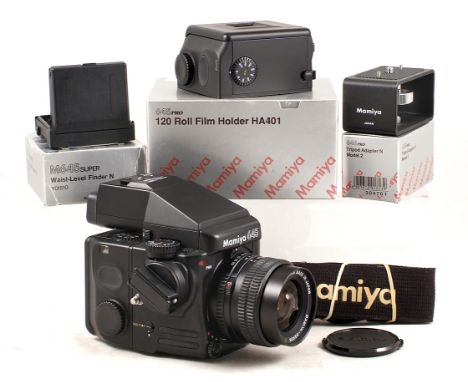 Mamiya 645 Pro camera body #NI1220 with 55mm f2,8 N wide angle lens, 120 film back and AE Prism  (all condition 5F). Also cam