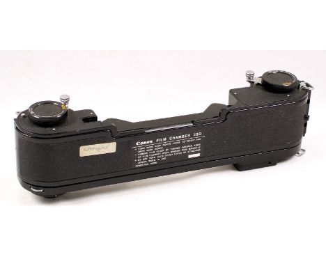 Canon 250 Film Chamber for F-1 camera with cassettes. Some degradation of internal foam & light traps. (condition 5F)