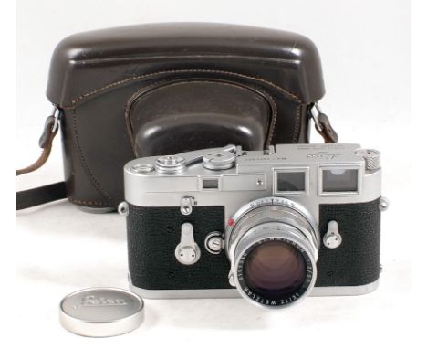 Chrome Leica M3 single wind camera body #1077021 (condition 5F) with Summicron 50mm f2 lens #2107390 (condition 5F) with cap,