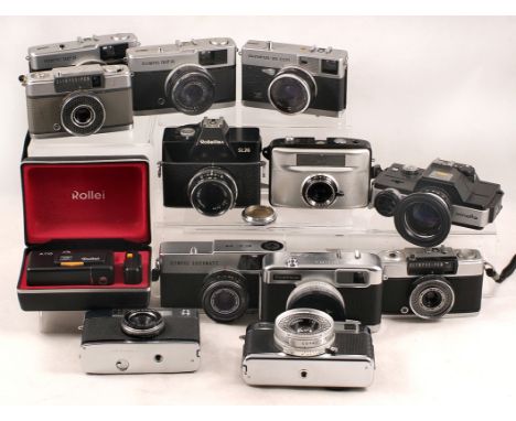 Collection of Half Frame & Other Cameras. Comprising Yashica Rapid 17, Rollei A110, Olympus Pen EE, 2 x Olympus Trips (red fl