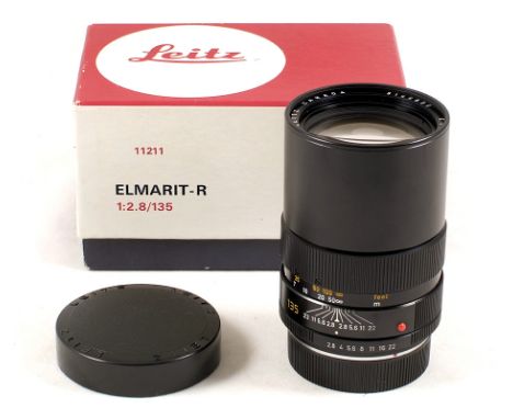 Leitz Canada Elmarit-R 135mm f2.8 3-cam lens #3146886 (condition 4F) with caps in makers box.