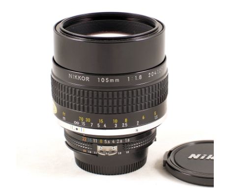 Nikkor 105mm f1.8 Ai-s manual focus lens #204105 (condition 4E) with caps.