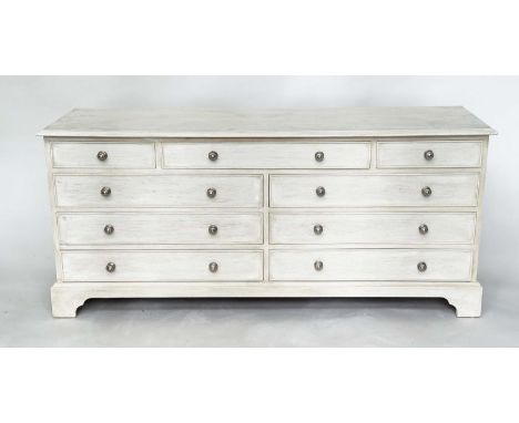 LOW CHEST, Georgian style grey painted with nine drawers and bracket supports, 152cm x 43cm x 67cm H. 