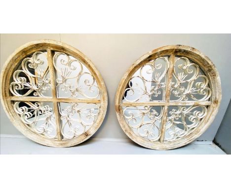 ARCHITECTURAL WALL MIRRORS, a pair, circular, distressed painted frames, 72cm diam. (2) 