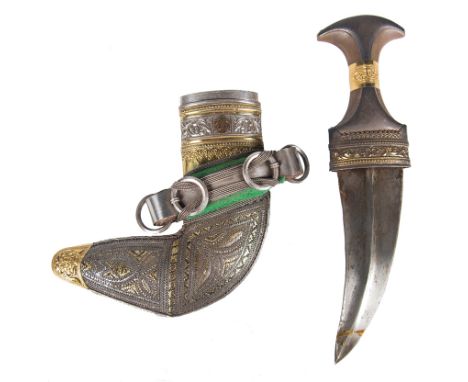 Arabian dagger. Possibly Yemen. Late 19th century - early 20th century.Jambia or yambiya with its sheath in leather and silve