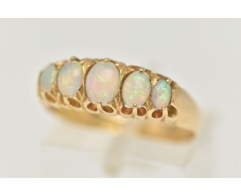 AN EARLY 20TH CENTURY, 18CT GOLD OPAL FIVE STONE RING, set with five graduated oval cut, opal cabochons, each claw set within