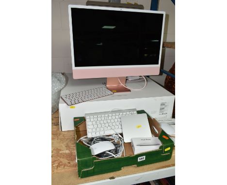 A REFURBISHED 24 INCH APPLE iMAC COMPUTER WITH BOX, model number A2438, together with an Apple A3179 SuperDrive, a wireless t