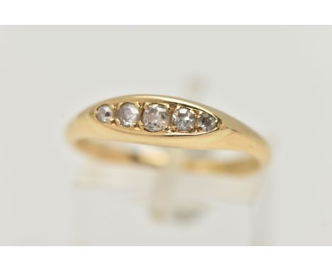 AN 18CT GOLD DIAMOND BOAT RING, set with five graduating, round brilliant and single cut diamonds, polished band, hallmarked 