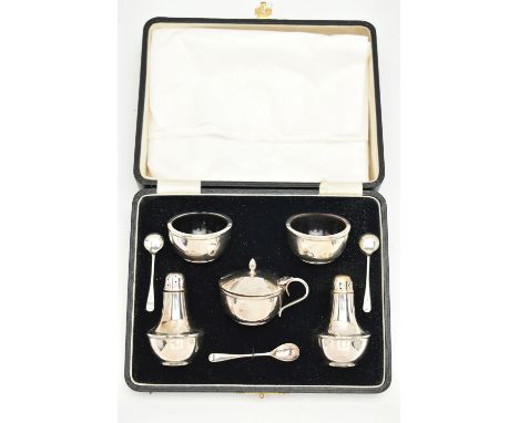 A CASED SILVER 'JOSEPH GLOSTER' CRUET SET, complete with two salts, two pepperettes, a mustard with hinged cover, all with Ba