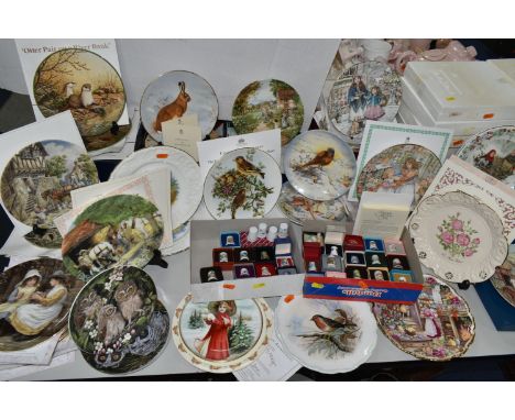 SEVENTY FOUR ROYAL DOULTON, WEDGWOOD, ROYAL WORCESTER AND COALPORT COLLECTORS PLATES, AND THIRTY TWO CERAMIC THIMBLES, depict