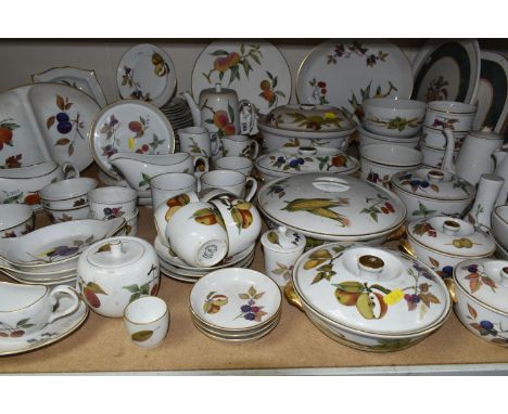 A LARGE QUANTITY OF ROYAL WORCESTER EVESHAM DINING WARE, including serving dishes, plates, teapots, casserole dishes etc. S.D