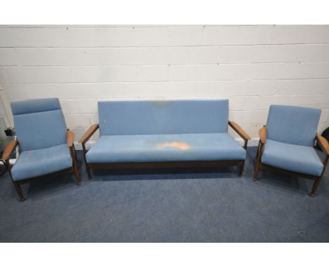 GUY ROGERS, A MID CENTURY TEAK 'MANHATTAN' THREE PIECE SUITE, covered with blue fabric, comprising a sofa bed, with open armr