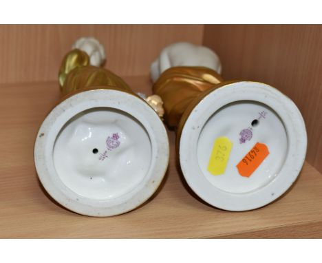 A PAIR OF ROYAL WORCESTER 'SORROW' AND 'JOY' FIGURES, with gilt robes, bearing puce backstamps, no 2/57 and date cyphers for 