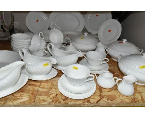 A QUANTITY OF WEDGWOOD 'CANDLELIGHT' DESIGN DINNERWARE, comprising three gravy/sauce jugs and stands, two oval serving dishes