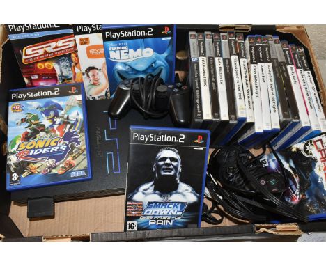 PLAYSTATION 2 CONSOLE AND GAMES, console is in working condition (see photo, television not included), all games are in worki