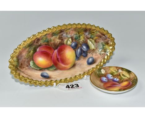 TWO ROYAL WORCESTER TRINKET DISHES, comprising an oval trinket dish decorated with fallen fruit and gilt gadrooned edge, sign