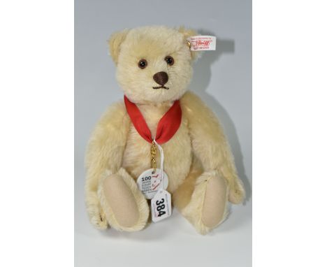 A STEIFF 100 YEARS ANNIVERSARY TEDDY BEAR, light blonde mohair 'fur', gold coloured ear button and white label no 671043, edi