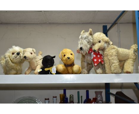 A QUANTITY OF ASSORTED MID 20TH CENTURY SOFT TOY DOGS AND A CAT, one of the dogs has a Norah Wellings label to the sole of it