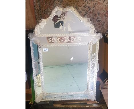 A Large Venetian glass hallway mirror, ribbed glass frills and bobbled edge. Glass panels are etched with rococo motifs and o