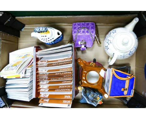 A quantity of ceramic novelty teapots together with a collection of first day covers etc. 