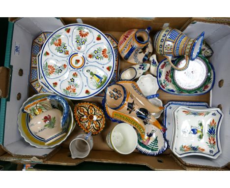 A collection of Quimper hand decorated items including vases , jugs, dishes, bowls etc 