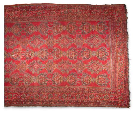 A LARGE TURKEY CARPET approximately 914 x 518cm   Condition Report:  As illustrated, wear overall consistent with age and use