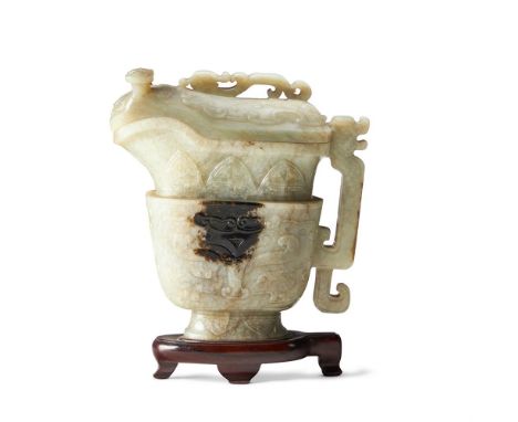 A CHINESE CELADON AND BLACK JADE CARVING OF AN 'ARCHAISTIC' RITUAL POURING VESSEL AND COVER, GUANG 17TH/18TH CENTURY carved w