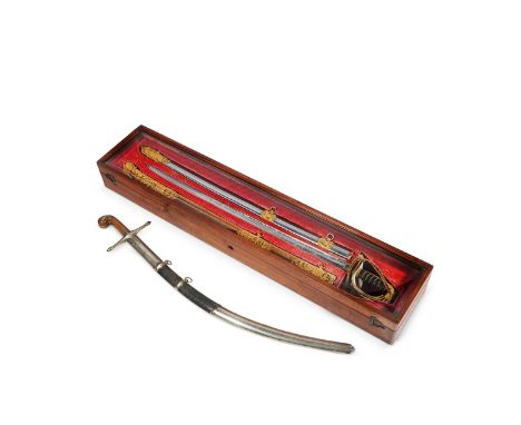 Y  A VICTORIAN PRESENTATION SWORD, BY REEVES, TOLEDO WORKS. BIRMINGHAM Inscribed "Presented to Captain C Legh by the non comm