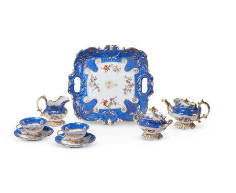 A PARIS PORCELAIN BLUE GROUND AND GILT PART TEA SERVICE, POSSIBLY JACOB PETIT MID 19TH CENTURY Comprising: A shaped square tw