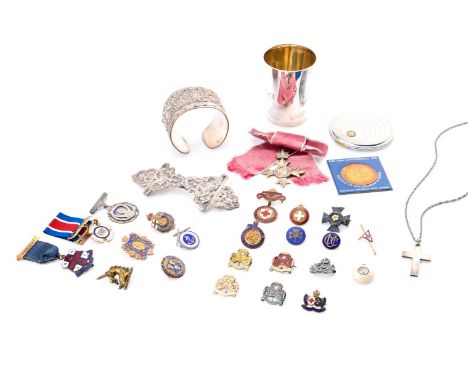 A COLLECTION OF MEDALS AND BADGES To include: an Order of the British Empire (O.B.E) medal, accompanied by an appointment let