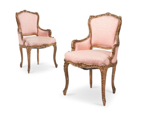 A PAIR OF GILTWOOD AND COMPOSITION ARMCHAIRS FRENCH OR ITALIAN, 19TH CENTURY Decorated overall with rockwork, shells and foli