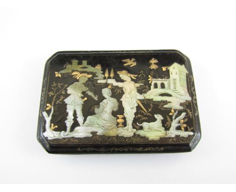 An early 18th Century tortoiseshell snuff box, rectangular with canted corners, the hinged lid decorated with yellow metal (t
