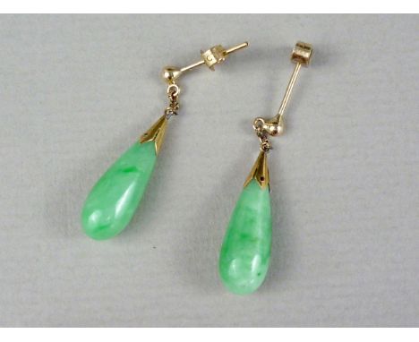 A pair of jade and yellow-metal pendant stud earrings, tests as gold