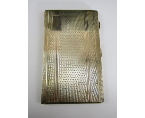 An early Elizabeth II silver cigarette case, of rectangular form with engine turned decoration, original manufactures paper t