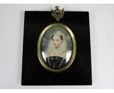 After Leon Victor Dupre (1816-1879) A three-quarter length portrait miniature of Mary Queen of Scots, with lace ruff and jewe
