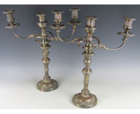 A pair of late 19th Century electroplate two branch three light candelabra, 46 cm high