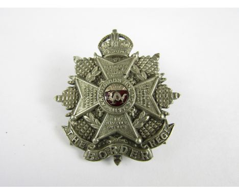 A Second World War Border Regiment officer's electroplate and enamel cap badge