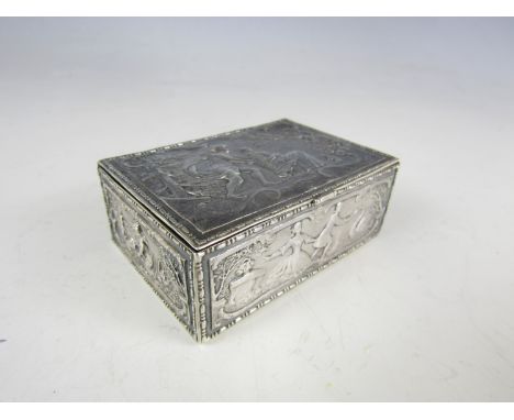 A Victorian silver snuff or trinket box, of rectangular form with hinged lid, the sides and cover decoratively bass moulded w