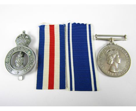 A Queen Elizabeth II Police Long Service and Good Conduct medal to Constable Wilfrid C Arnold, together with a Southport Boro