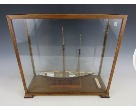 [Model boats / ships]  A fine hand-built scale model of a Grand Banks Schooner, in glazed oak case, case 44 x 17 x 40 cm high