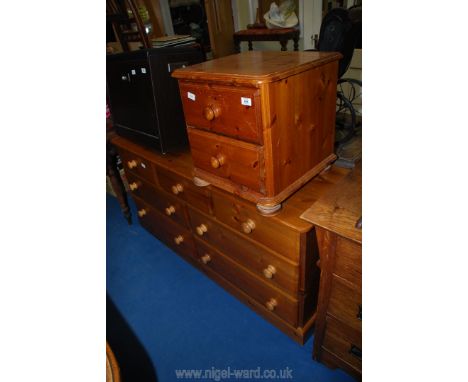 A 3 small over 4 long chest of drawers 58" wide x 18" deep x 29" high and a bedside cabinet.