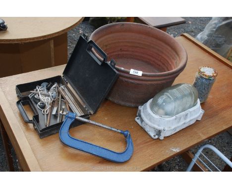A salt glazed planter, G clamp, outside light and galvanised plaster board nails.