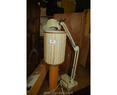An angle poise magnifying light and a lamp. 