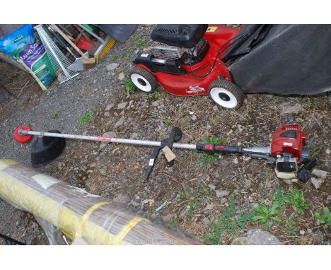 A Kawasaki strimmer (sold as seen, engine not turning).