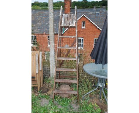 A vintage wooden step ladder