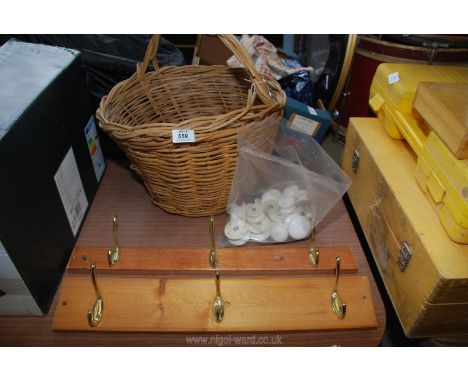 Basket, ceramic door knobs and coat hook.
